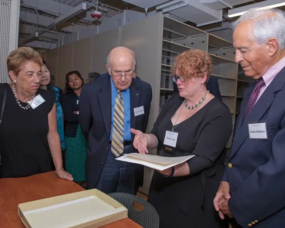 Martha Stewart Photography Shulamit Reinharz, Gilbert Omenn, and Jehuda Reinharz with Academy Director of Archives Michele Lavoie, photo by Martha Stewart Photography
