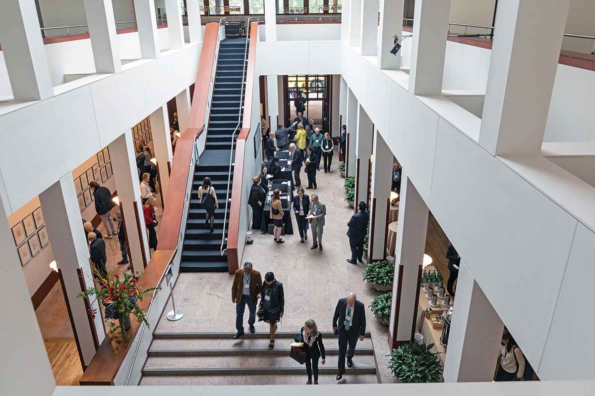 Attendees gather at the House of the Academy during the Open House event before the 2023 Induction ceremony.