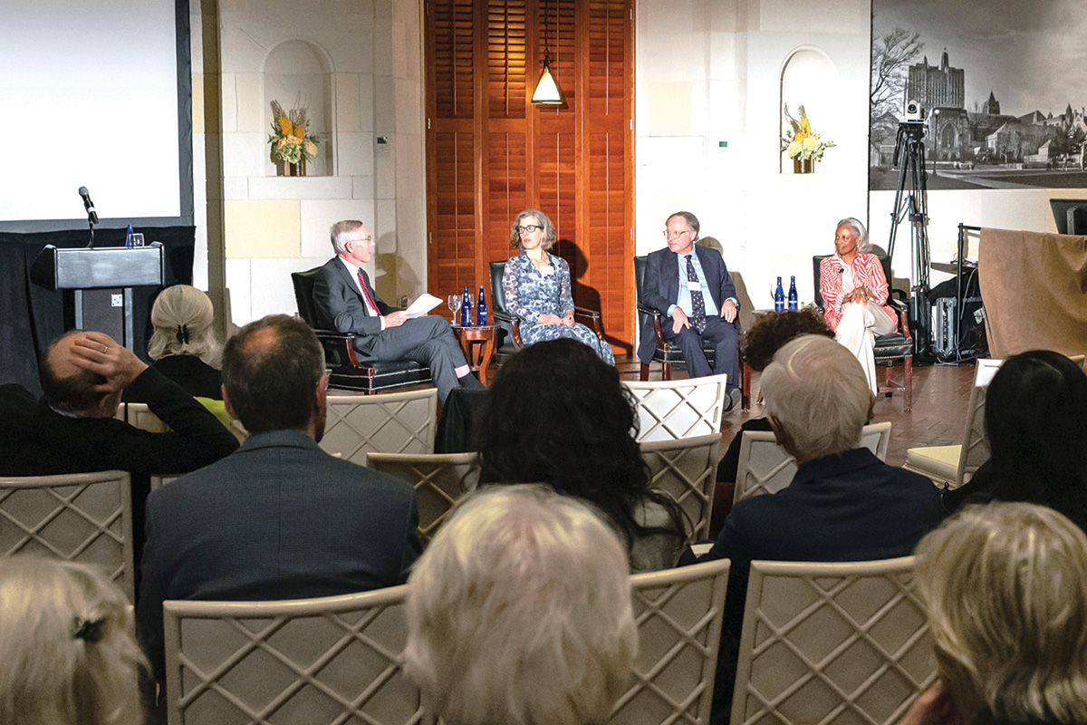 Members of the New York Program Committee speak on stage in front of an audience to promote the work of the Commission on Reimagining Our Economy.