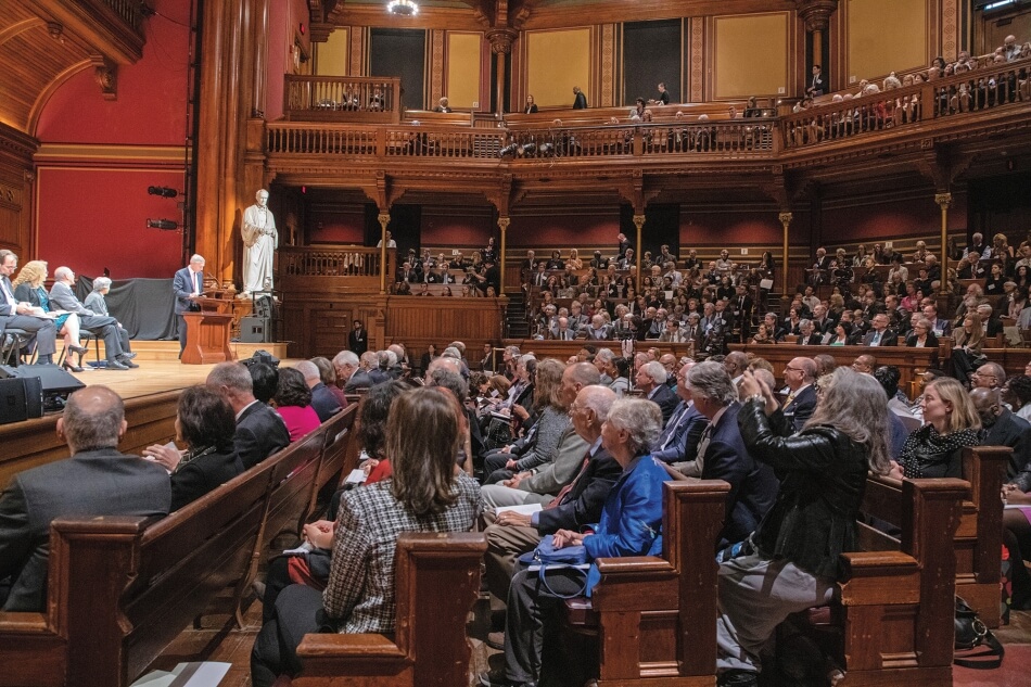 Martha Stewart Photography crowd at induction ceremony in Sanders Theatre at Harvard University