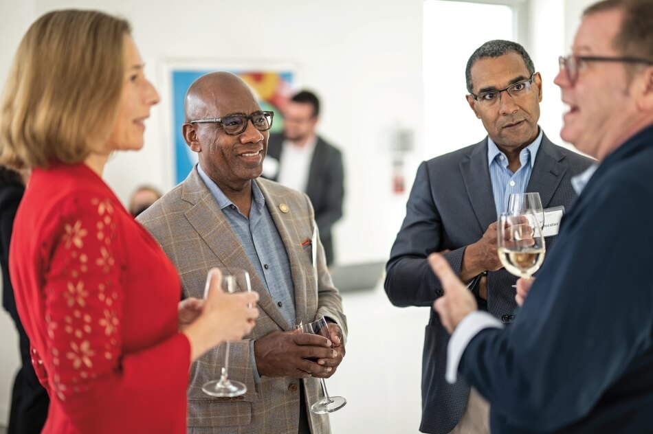 President David Wilson (Morgan State University) and President Sean Decatur (Kenyon College) talk with Provost C. Cybele Raver (Vanderbilt University) and Dr. Seth Pollak (University of Wisconsin–Madison). 