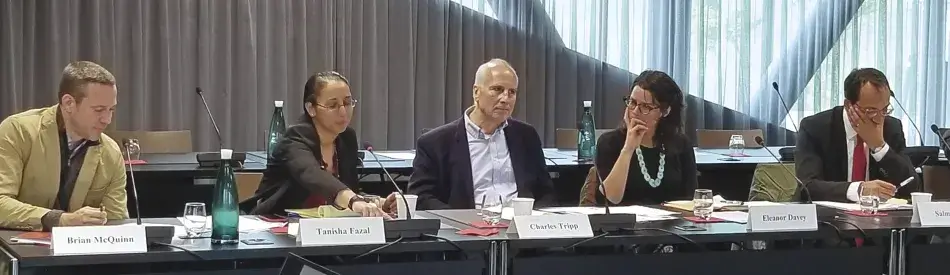 Brian McQuinn, Tanisha Fazal, Charles Tripp, Eleanor Davey, and Salman Bal participate in a panel discussion at the workshop in Geneva. Brian McQuinn, Tanisha Fazal, Charles Tripp, Eleanor Davey, and Salman Bal participate in a panel discussion at the workshop in Geneva.