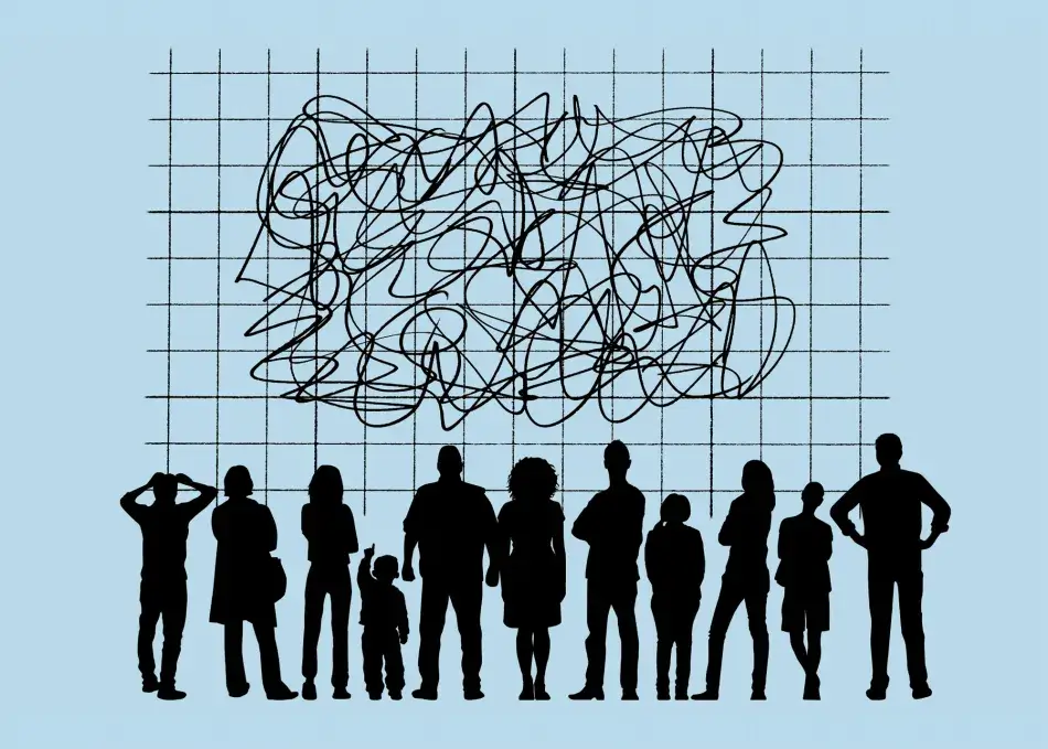 iStock.com/DNY59 People looking at a scrambled line on a graph