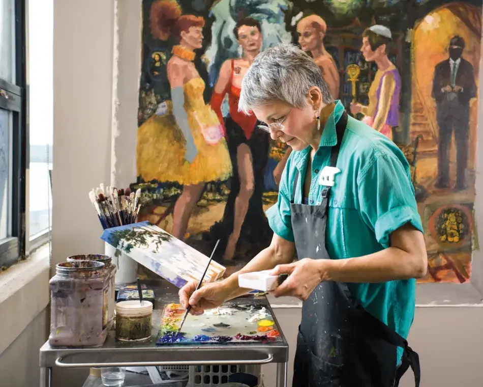Courtesy of Torpedo Factory Art Center Woman painting in a studio. Courtesy of Torpedo Factory Art Center