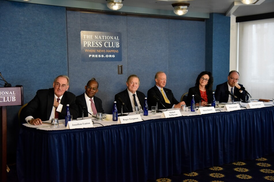 Members of the Commission on the Future of Undergraduate Education unveil the final report during a press conference in Washington, D.C.