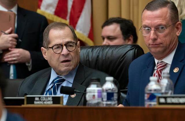 House Judiciary Committee Chairman Jerrold Nadler, D-N.Y., and Rep. Doug Collins, R-Georgia, right, the ranking member, listen to debate on amendments as the panel approved procedures for upcoming impeachment investigation hearings on President Donald Trump, on Capitol Hill in Washington, Thursday, Sept. 12, 2019.