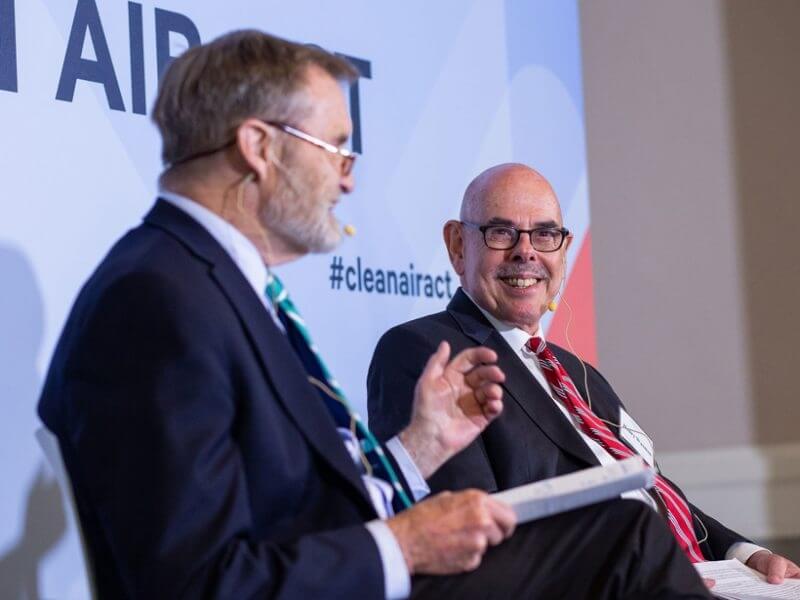 Former Rep. Philip Sharp (D-Ind.) and former Rep. Henry Waxman (D-Calif.) speak at a forum discussing lessons from the Clean Air Act.