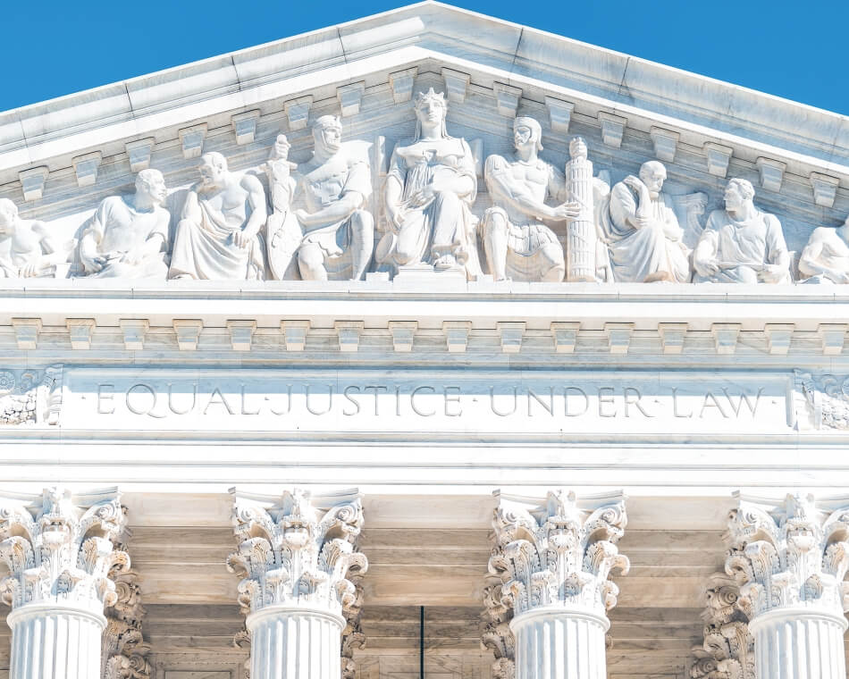 iStock.com/krblokhin Washington DC, USA exterior of Supreme Court building marble architecture and closeup on Capital capitol hill columns pillars by entrance and sign. iStock.com/krblokhin