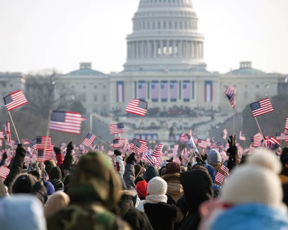 The inauguration of President Barack Obama, January 20th 2009.  Unrecognizable crowds in the Washington Mall. Photo by iStock.com/carterdayne