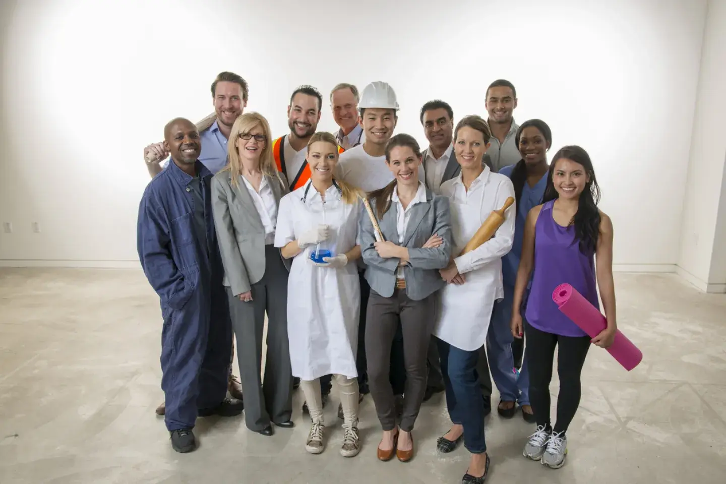 Varied Group of Workers posing for a photo
