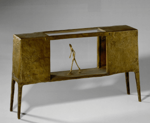 Sculpture of man walking through empty space