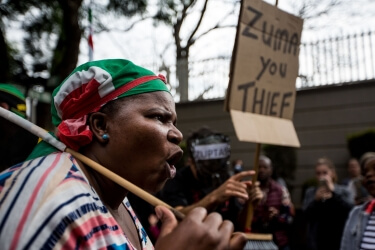 Woman protests South African president Jacob Zuma