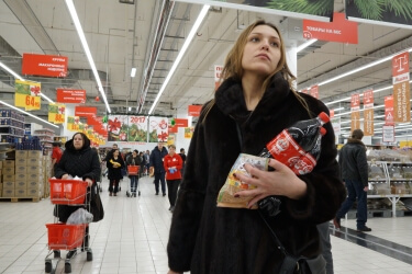 Woman shopping in Russian supermarket