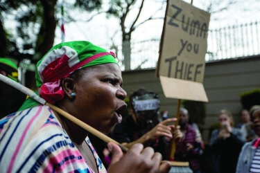 Woman protests South African president Jacob Zuma