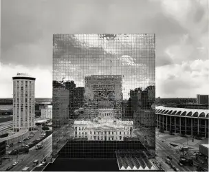Old courthouse reflected in glass of new courthouse in St. Louis