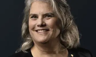 Portrait of Andrea Ghez with photo credit to Nobel Foundation.