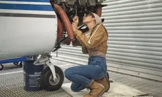 Student mechanic working on airplane in Williamsport, PA.