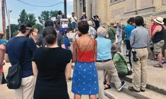 People Standing and Listening