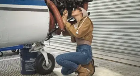 Student mechanic working on airplane in Williamsport, PA.