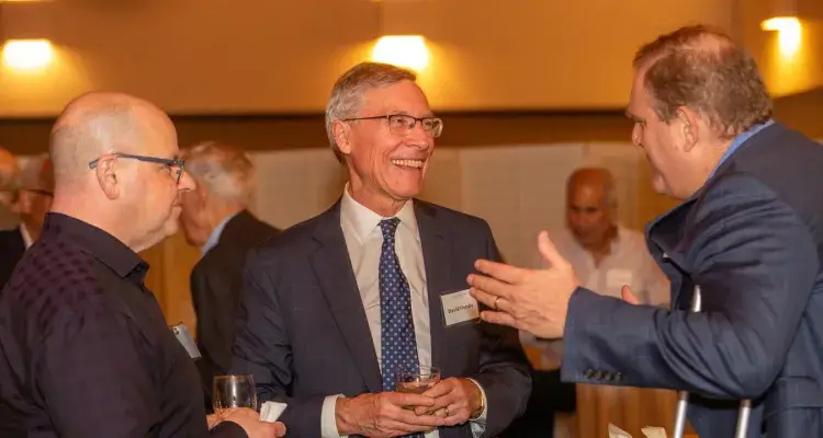 Academy President David Oxtoby speaks to members at an event in Stanford, CA.