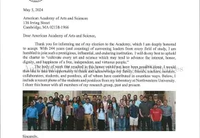 Typewritten letter with color photograph of students from Mark C. Hersam