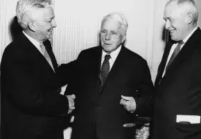 Kirtley F. Mather, President of the Academy (left) and Kenneth B. Murdock, Chair of the Emerson-Thoreau Award Committee (right), present poet Robert Frost with the Academy's first Emerson-Thoreau Award in October 1958