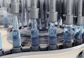 Close-up of a medical ampoule production line at a pharmaceutical factory.
