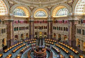 Main reading room with desks for researchers at the Library of Congress in the Thomas Jefferson Building, Washington, D.C.