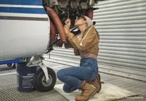 Student mechanic working on airplane in Williamsport, PA.