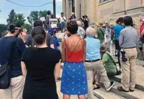 People Standing and Listening