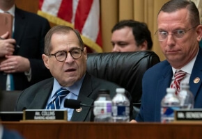 House Judiciary Committee Chairman Jerrold Nadler, D-N.Y., and Rep. Doug Collins, R-Georgia, right, the ranking member, listen to debate on amendments as the panel approved procedures for upcoming impeachment investigation hearings on President Donald Trump, on Capitol Hill in Washington, Thursday, Sept. 12, 2019.