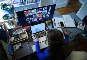 A substitute teacher works from her home due to the coronavirus outbreak.