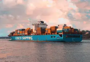 Cargo Ship and Sky photo by Andreas Dittberner