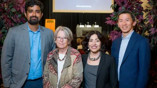Posed portrait of the four speakers at the Berkeley event on artificial intelligence.
